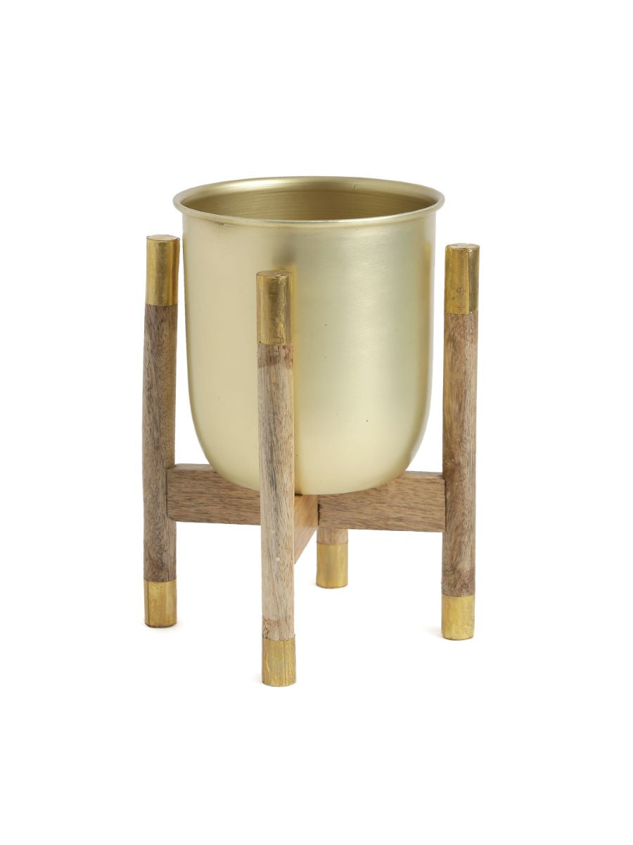 Metal Planter On Wooden Stand In Brass Finish