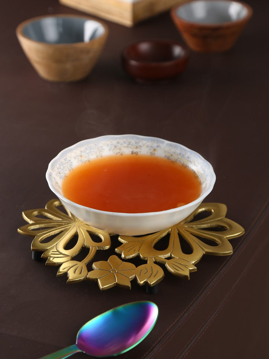 Flower Design Trivet In Matt Gold Finish