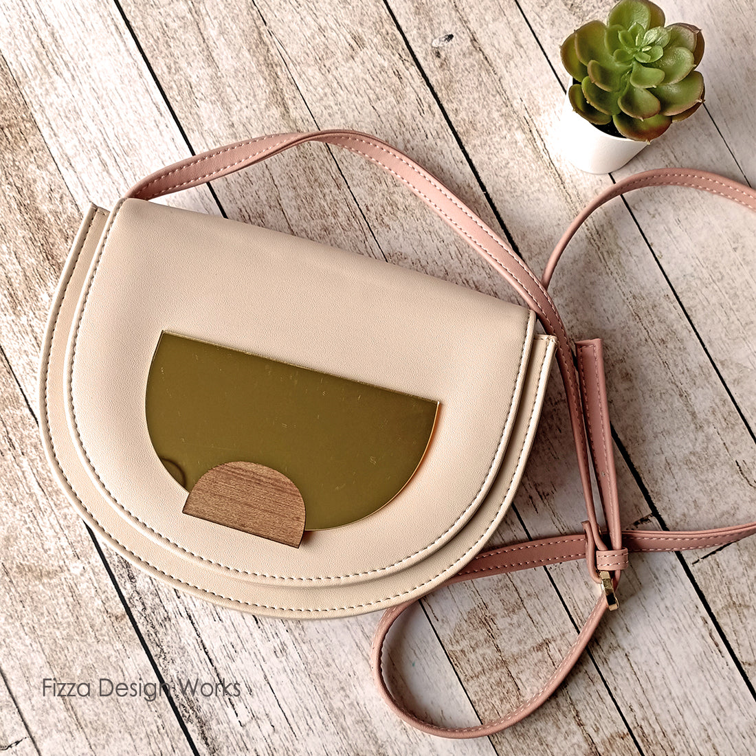 Half Circle Sling Bag With Applique Detail
