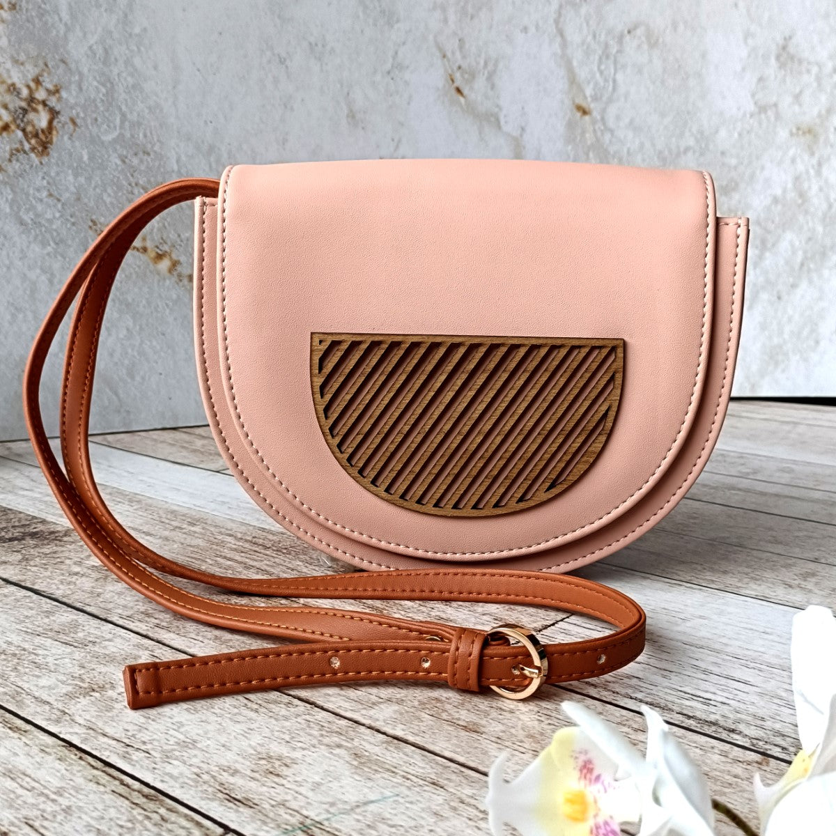 Half Circle Sling Bag With Applique Detail
