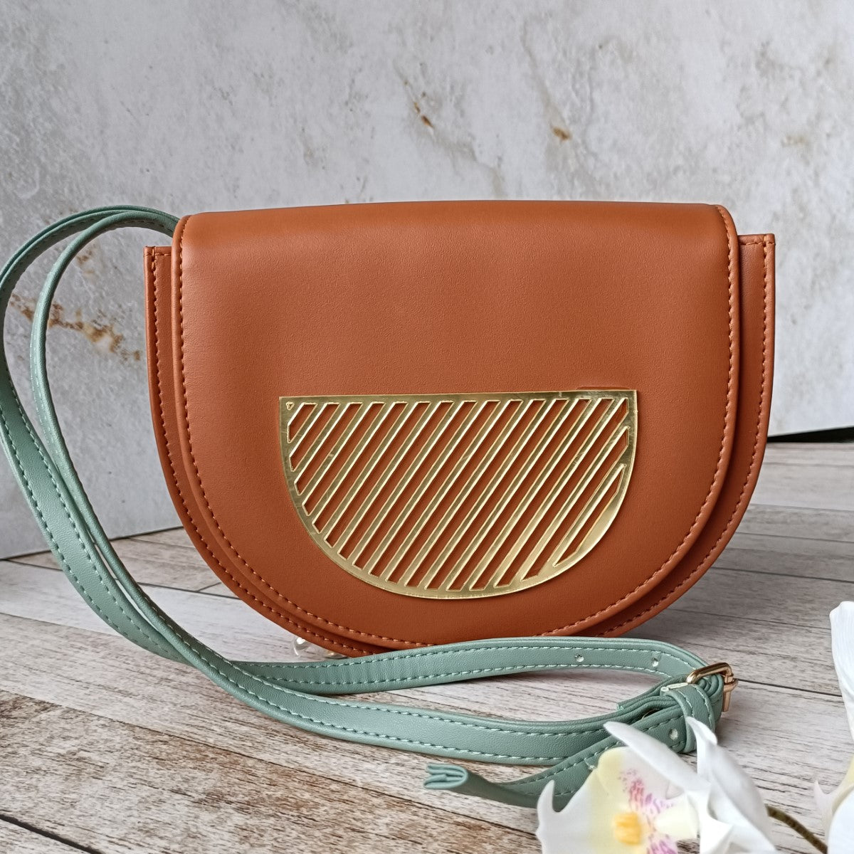 Half Circle Sling Bag With Applique Detail