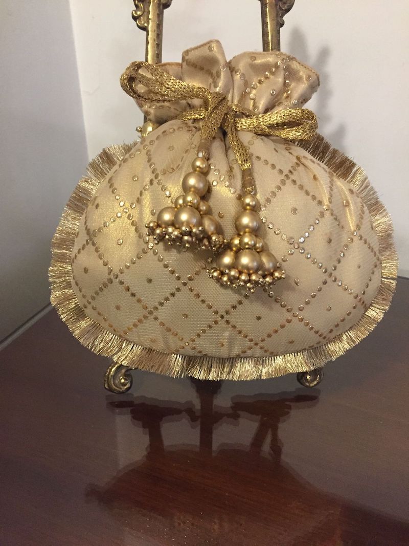 Golden Handmade Potli in Net Fabric