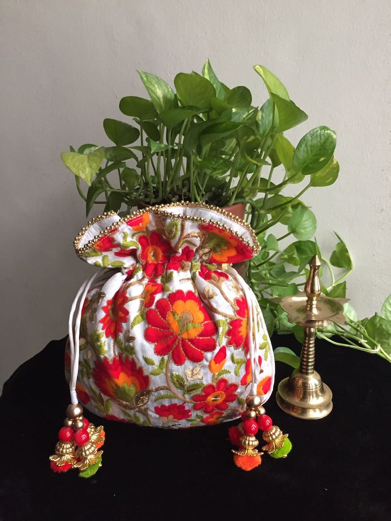 Orange & Red Potli with Thread Embroidery on Dupian Silk