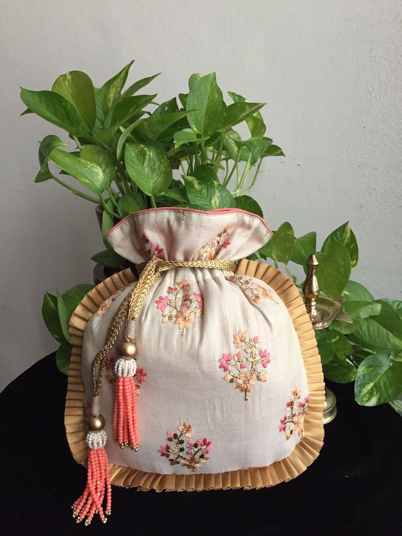 Off-White Thread Embroidered Potli Bag
