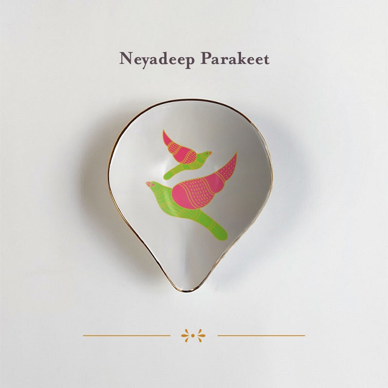 Neyadeep Paakhi  (Set of 4 Porcelain Diyas) with Wicks