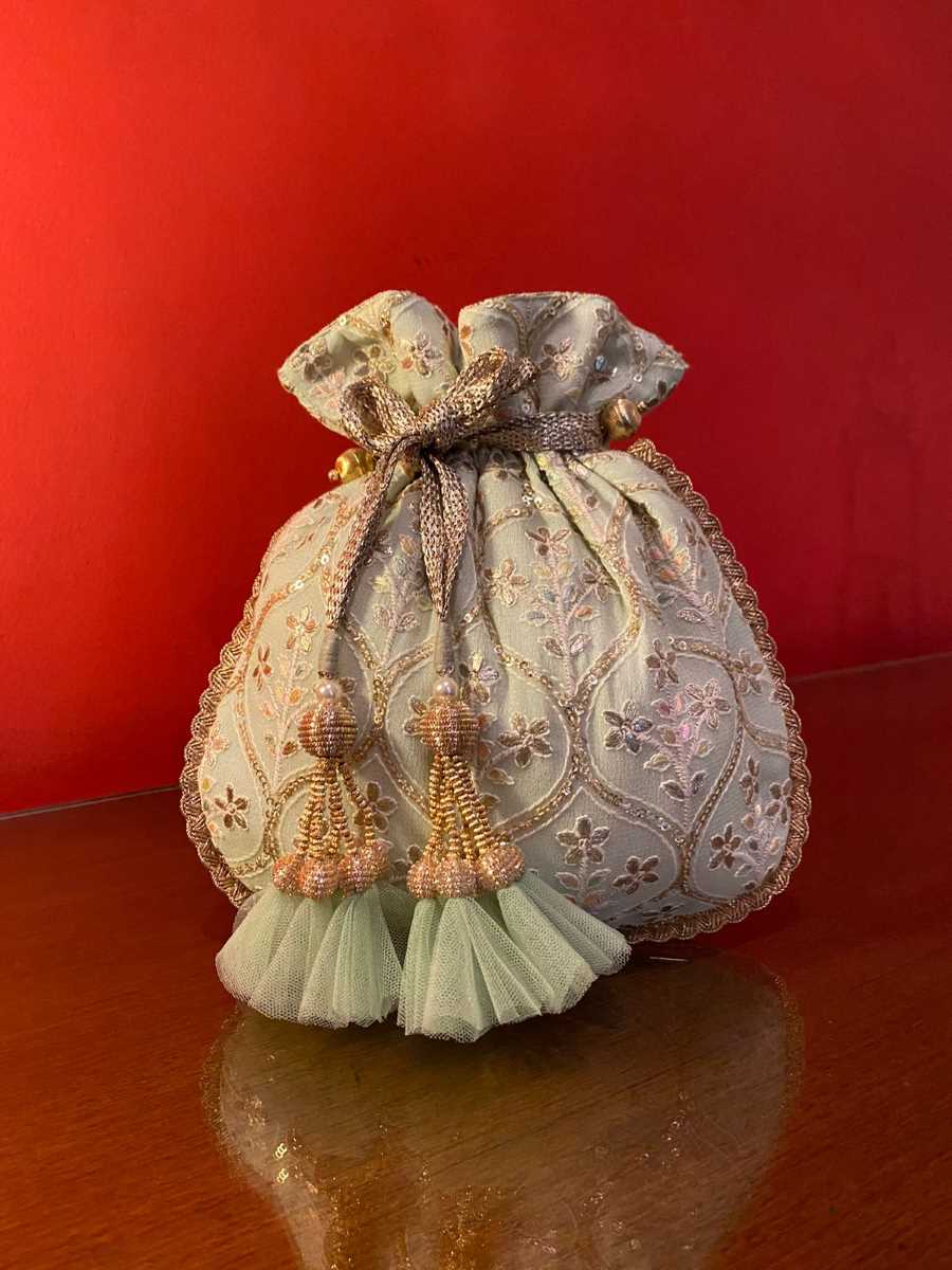 Embroidery on Pista Georgette Potli